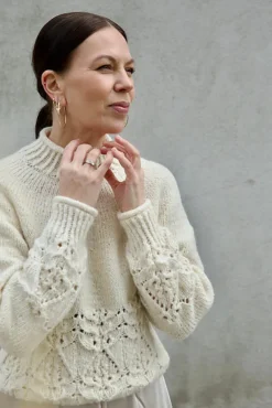 Blanc de Blancs Sweater by Leeni Hoimela, in english